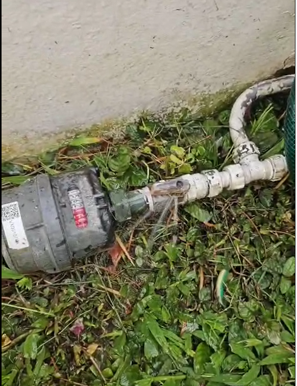 Before photo of piping leakage under sink in Singapore